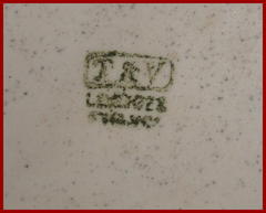 Signature: "T&V" in a rectangle above "Limoges, France"